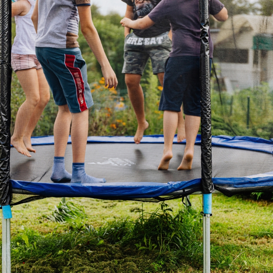 kids playing on a trampoline