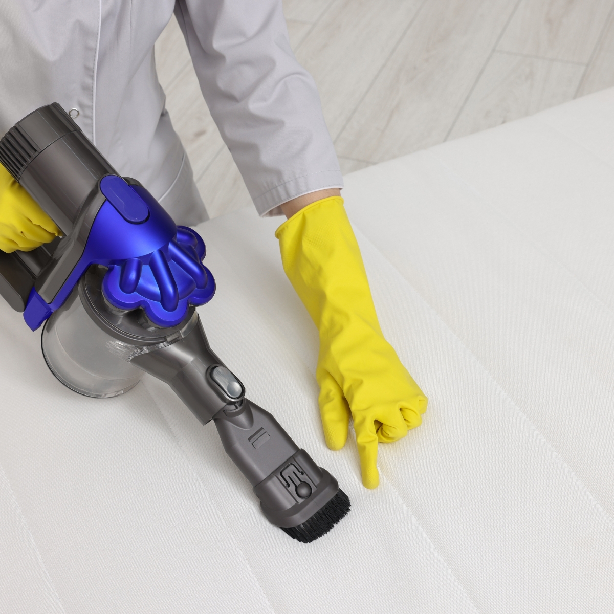 vacuuming a futon mattress