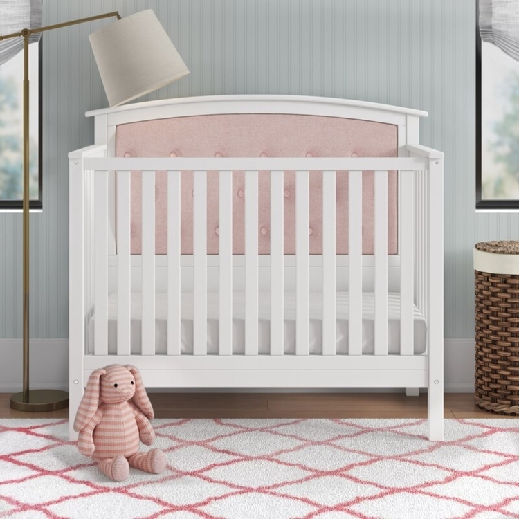 white tufted crib