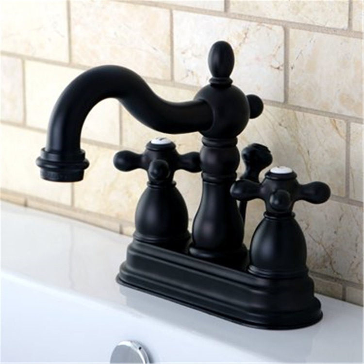 Kingston Brass Heritage Two Handle 4" Centerset Lavatory Faucet with Retail Pop-up image - 1