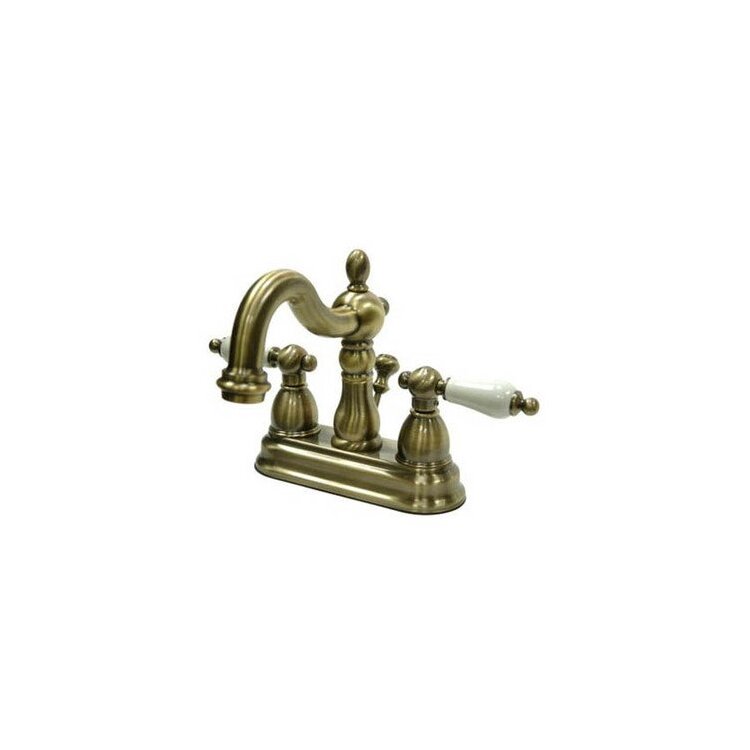 Vintage Brass Centerset Lavatory Faucet 2 Handles 4 Valve Included - Kingston Brass image - 1